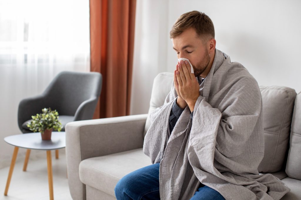 man having a cold and flu